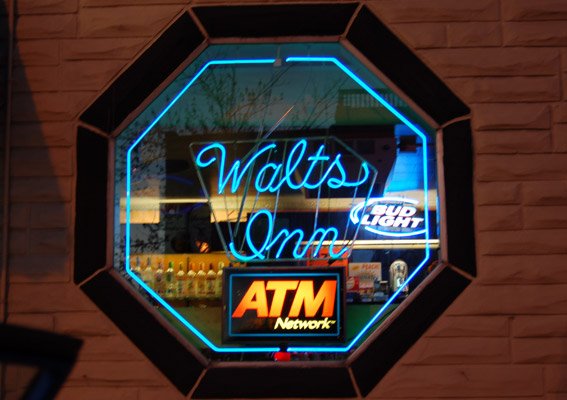 Our neon sign lighting the night